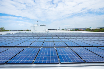 Solar panels on factory roof © kinwun