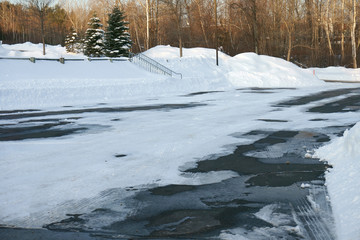 Naklejka premium empty parking lot with snow removed