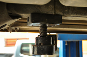 Lift up the car for maintenance at the garage