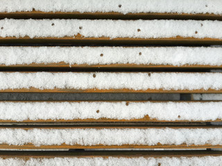 White snow on the wooden board