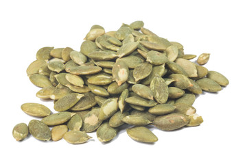 Dried pumpkin seeds isolate on white
