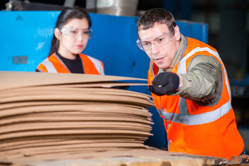 Paper mill factory workers