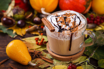 Pumpkin Smoothies,Spicy Drink is a cinnamon Dolce Latte,whipped cream and chocolate syrup.Autumn still-life.selective focus.