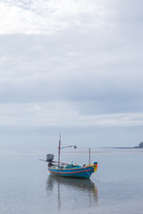 Naklejka na ściany i meble Small fishing boat