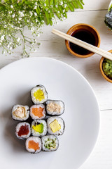various of maki sushi on white plate