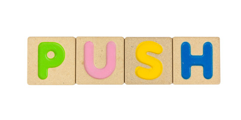 PUSH wooden alphabet isolated on white background