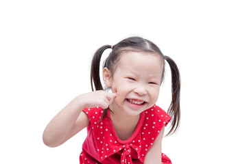 Little asian girl smiling over white background