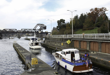 Fototapeta premium Boats leave the Ballard Locks