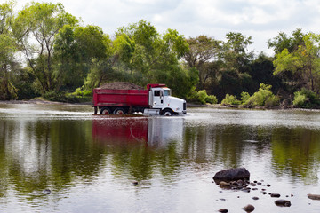 Truck crossing river
