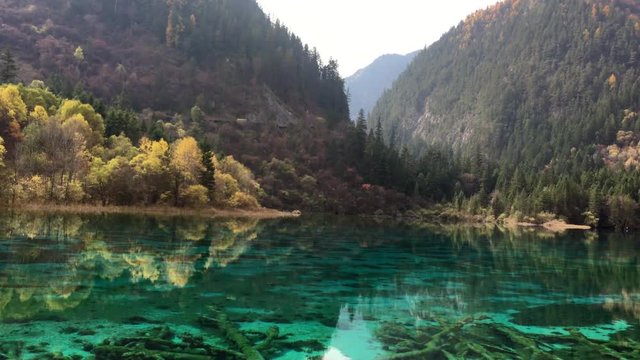 Beautiful five flower pond  at Jiuzhaigou National Park  lake,  The UNESCO World Heritage in Sichuan , China in  Autumn  in November  located in  in  Tibetan-Qiang of Sichuan ,China