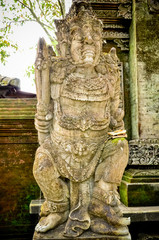 ancient art statues in the temple at Bali