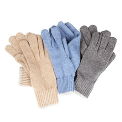 three pairs of knitted gloves