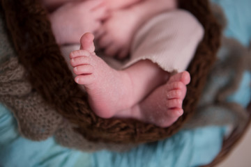 The feet of a newborn baby