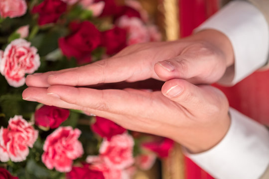 Men with hands clasped