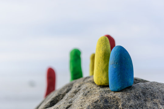 Coloured stones on coast