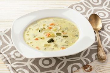 Vegetarian soup with zucchini, carrot and potatoes.