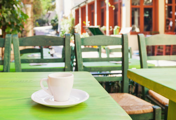 A cup of coffee on table, mediterranean style