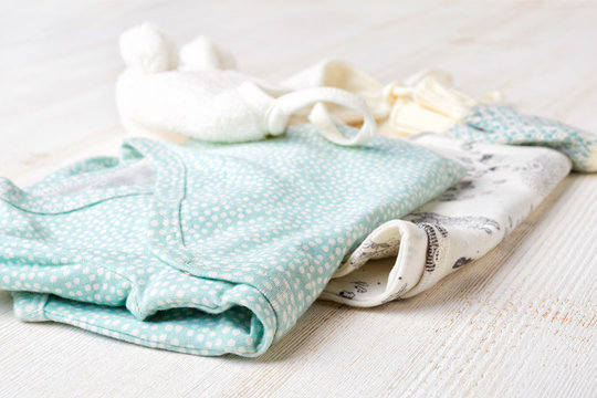 Set of blue baby clothes, close up