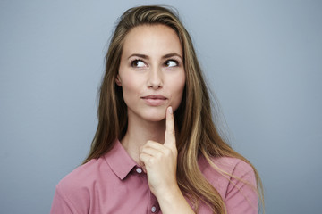 Beautiful woman in pink finding inspiration