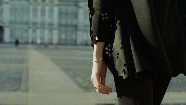 Woman wearing gold bracelet