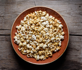 popcorn on a plate top view