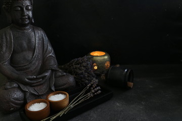 buddah witn candle spa concept