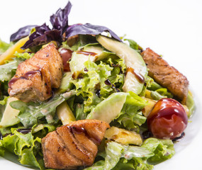 salad with smoked red fish with fresh lettuce leaves and basil