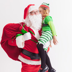 Christmas Wish 2016. Santa Claus and Little Girl. Telling Wishes