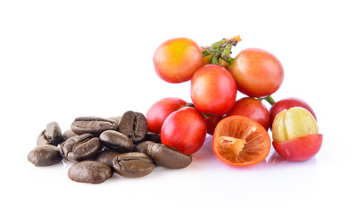 coffee grains and leaves on white background