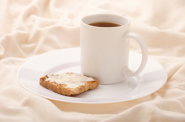 Black tea  and toast in bed.