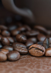 Coffee cup and roasted coffee beans