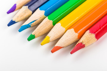 Fototapeta premium Many different colored pencils on white background