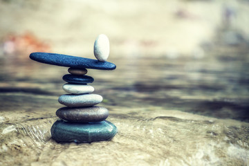 Rock Zen Stack in front of waterfall.