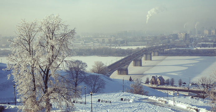 Panoramic view from the Fedorovsky embankment on Kanavinsky bridge and the Trade Fair in Nizhny Novgorod city. In wintertime