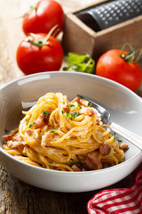 Tomato pasta with egg sauce, cheese and ham
