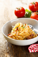 Tomato pasta with egg sauce, cheese and ham

