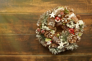 Delicate Christmas wreath of pine cones