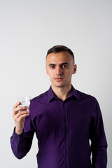 The young man drinks water