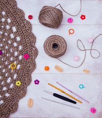 Crochet accessories. Balls of yarn with needles and crochets on white background. Leisure, handiwork, hobby concept