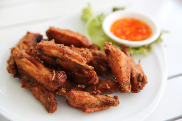 Fried chicken on wood background