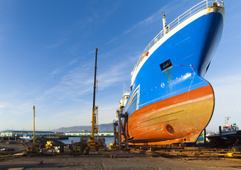 Iceland Reykjavik ship under maintenance in the city's shipyards with blue sky