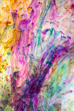 Acrylic colors and ink in water. Abstract background.