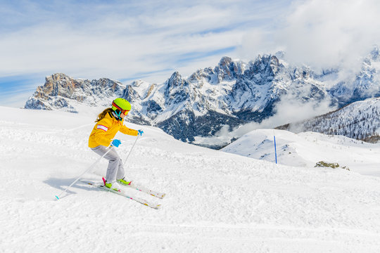 Teenage girl skiing in Italian Alps in Sunny Day, San Martino di