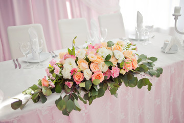 Beautiful wedding table with flower decoration