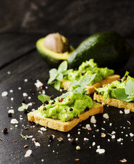 toast with a paste of avocado and pesto basil, spices