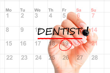 Dentist appointment reminder on calendar planner