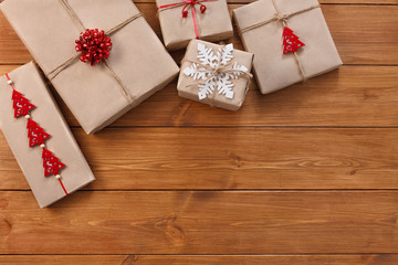 Christmas gift boxes on wood frame background