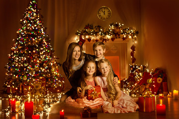 Christmas Family, Xmas Tree in Decorated Home Interior