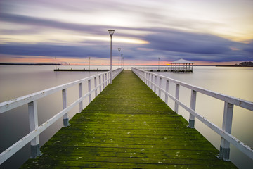 Obraz premium wooden pier by the sea