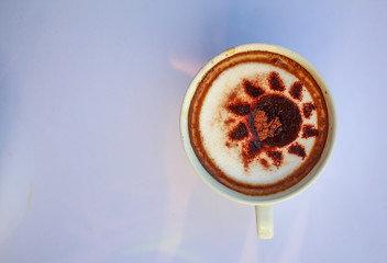 the sun in coffee cup